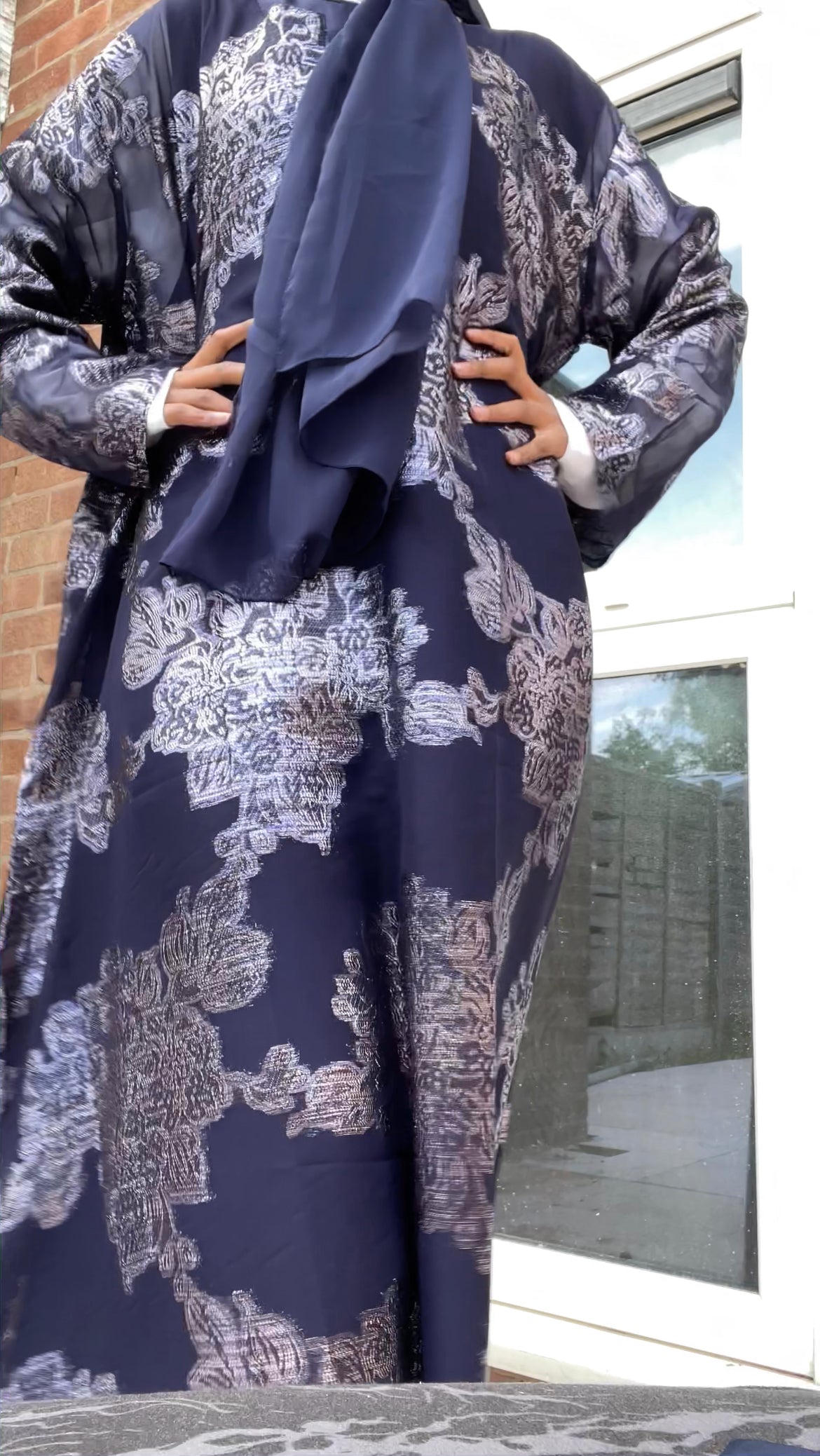 A closed Fransawi Dress in Navy Blue