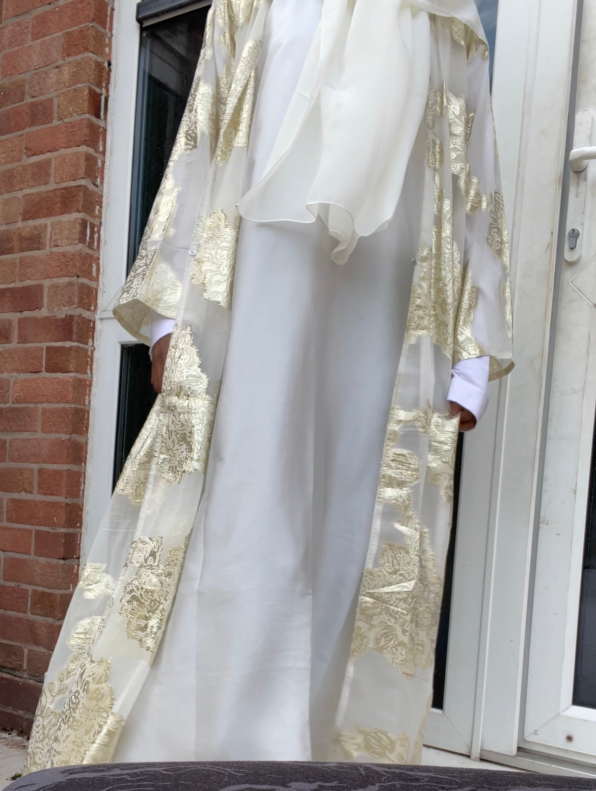 An open Fransawi Dress in White