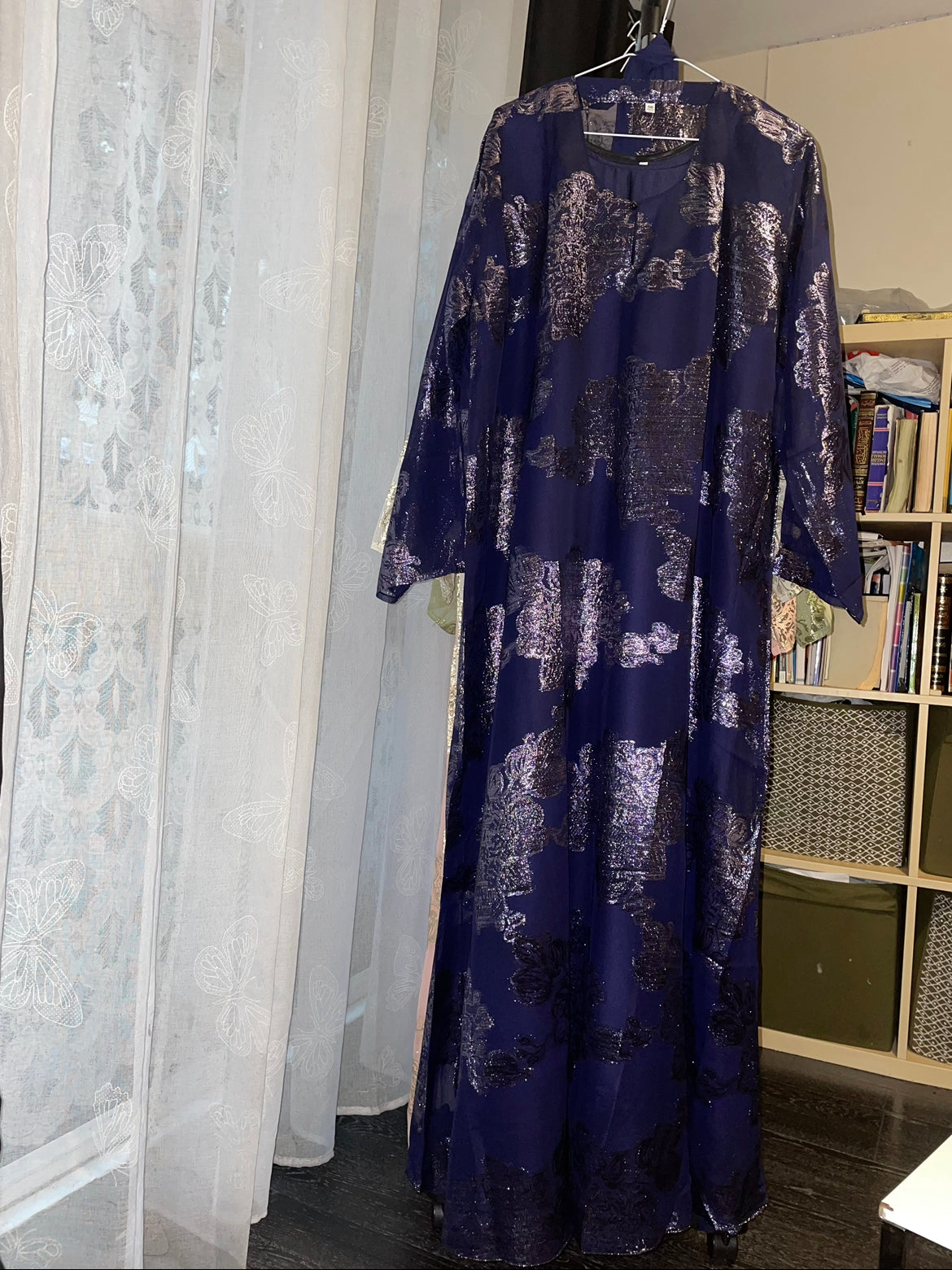 A closed Fransawi Dress in Navy Blue