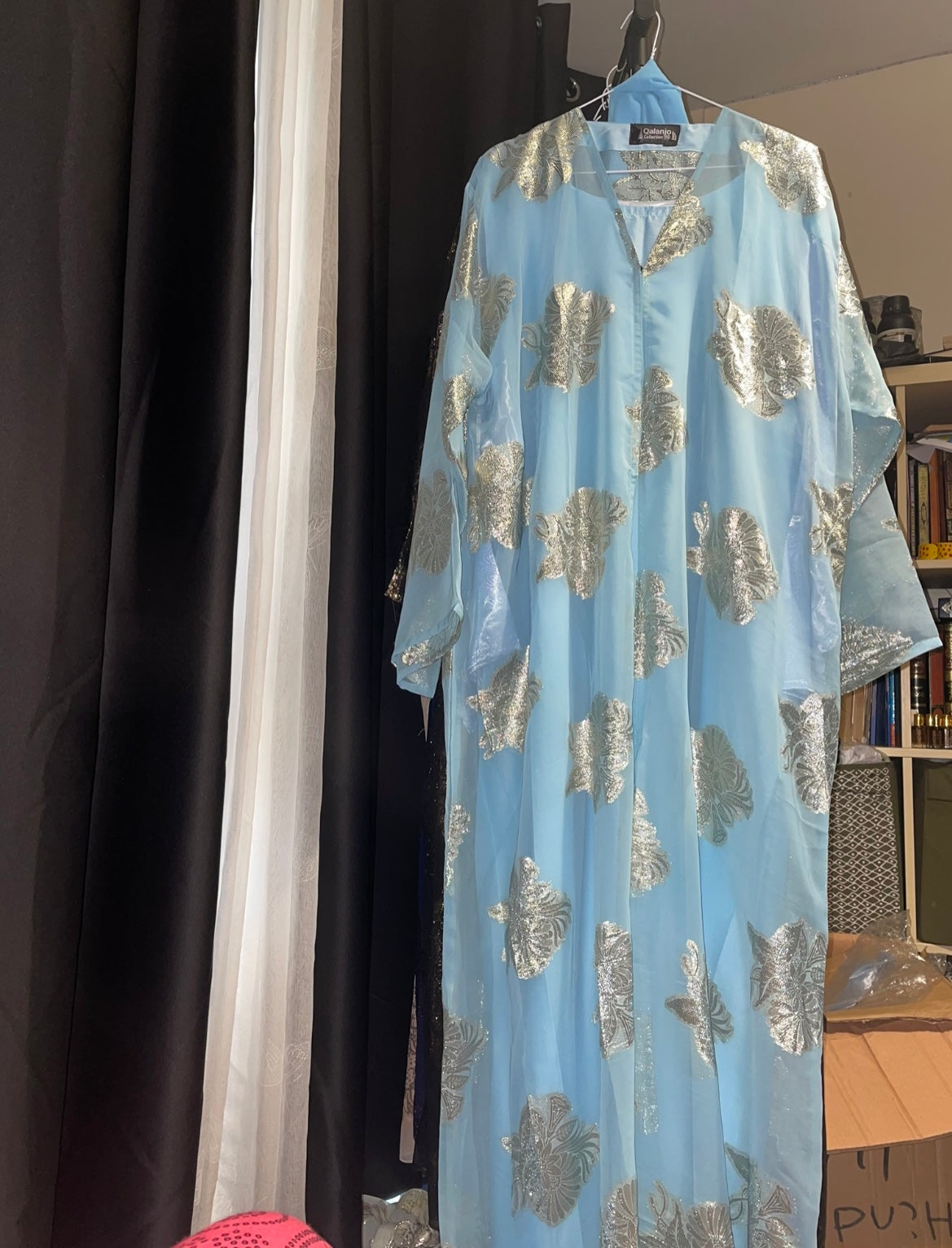 An open fransawi dress in sky Blue