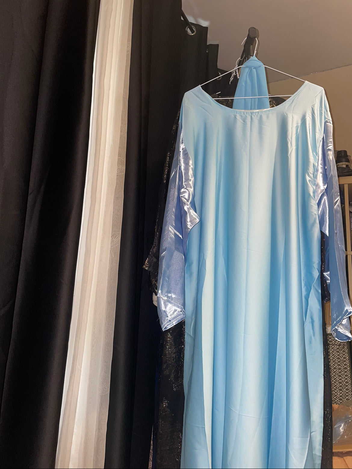 An open fransawi dress in sky Blue