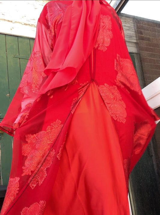 An open Fransawi Dress in Red