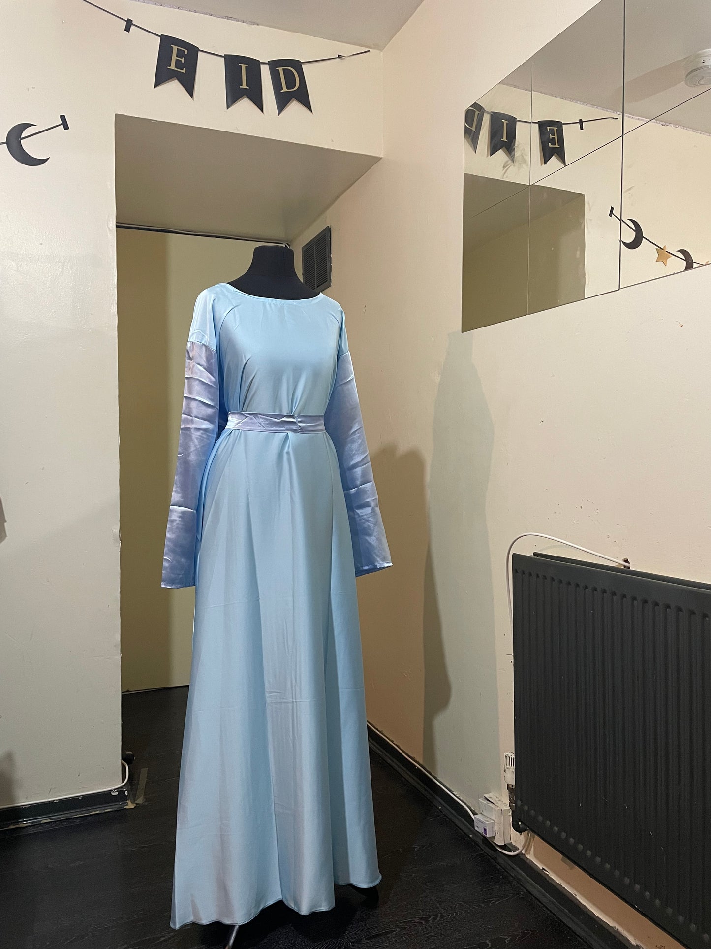 An open fransawi dress in sky Blue