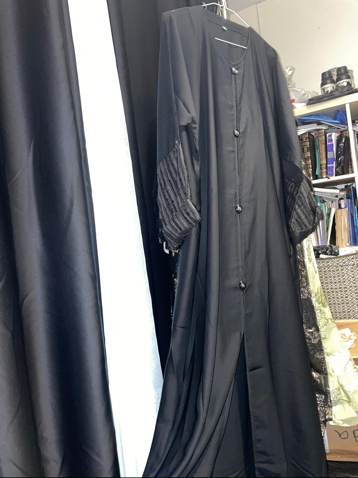 Closed black abaya with slit