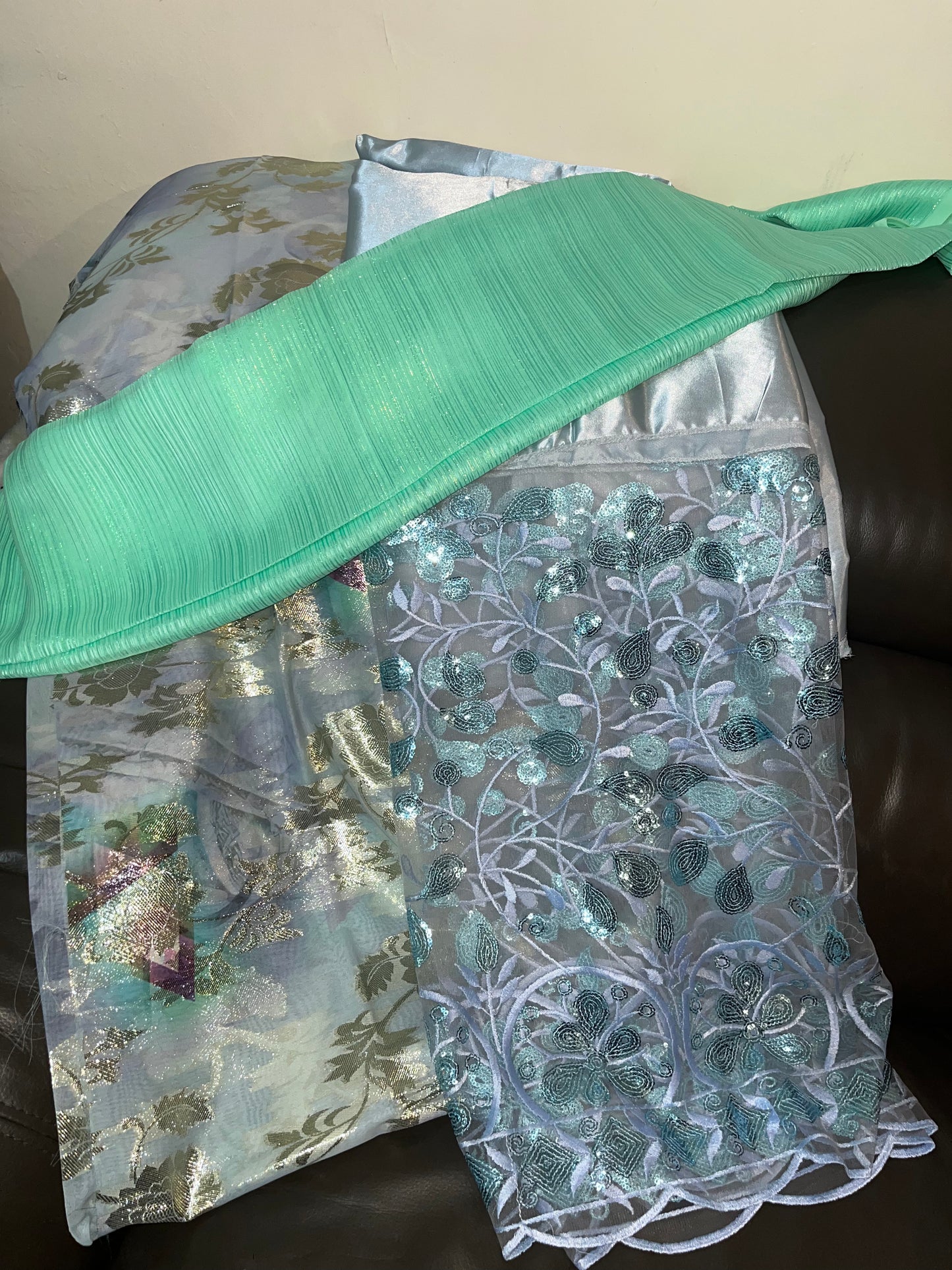 Light blue dirac with light green scarf