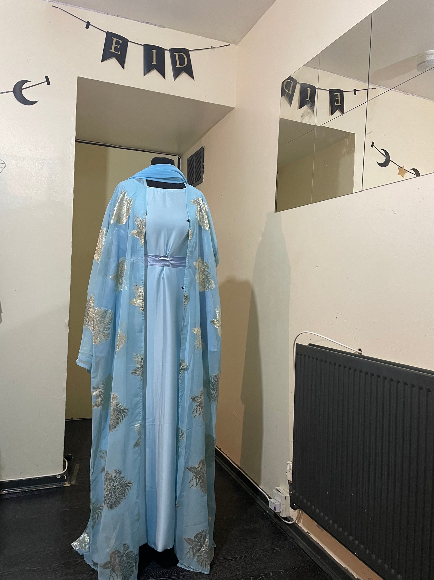 An open fransawi dress in sky Blue